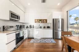 Light-Filled Home in K-Town | Parking, Gym & Views