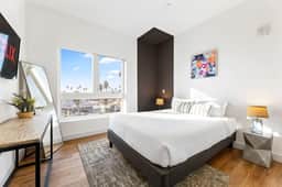Light-filled K-Town Home- Parking + Gym- Near HWD