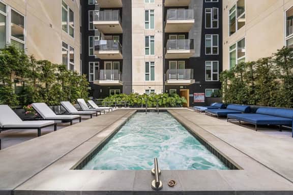 Light-Filled 2BD | Free Parking | Hot tub + Gym