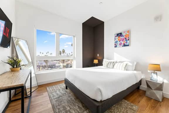 Light-filled K-Town Home- Parking + Gym- Near HWD