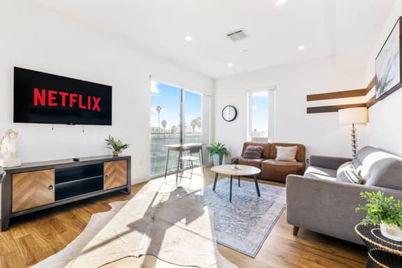 Light-filled K-Town Home- Parking + Gym- Near HWD